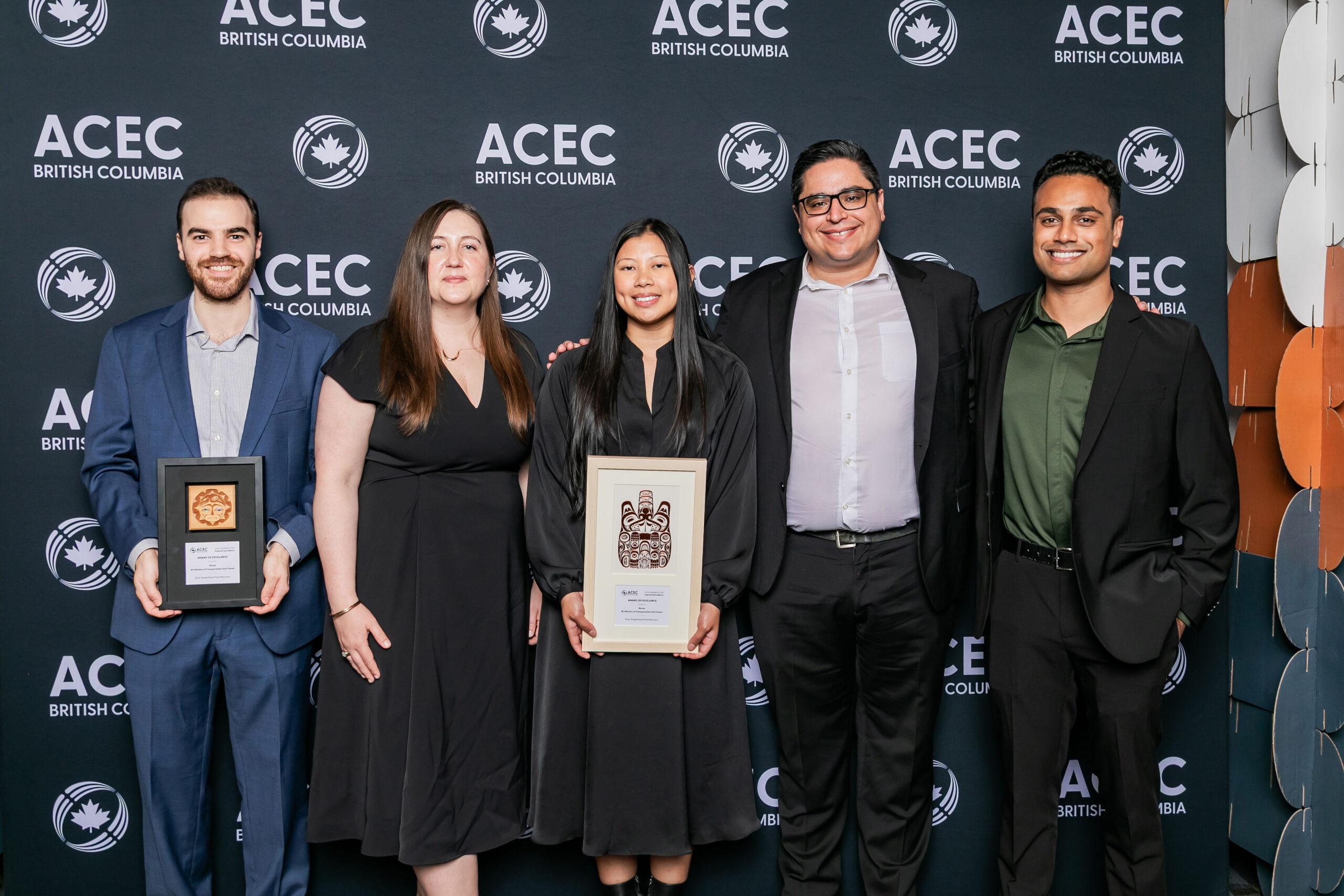 Group photo of Binnie team members receiving an ACEC-BC Award of Excellence